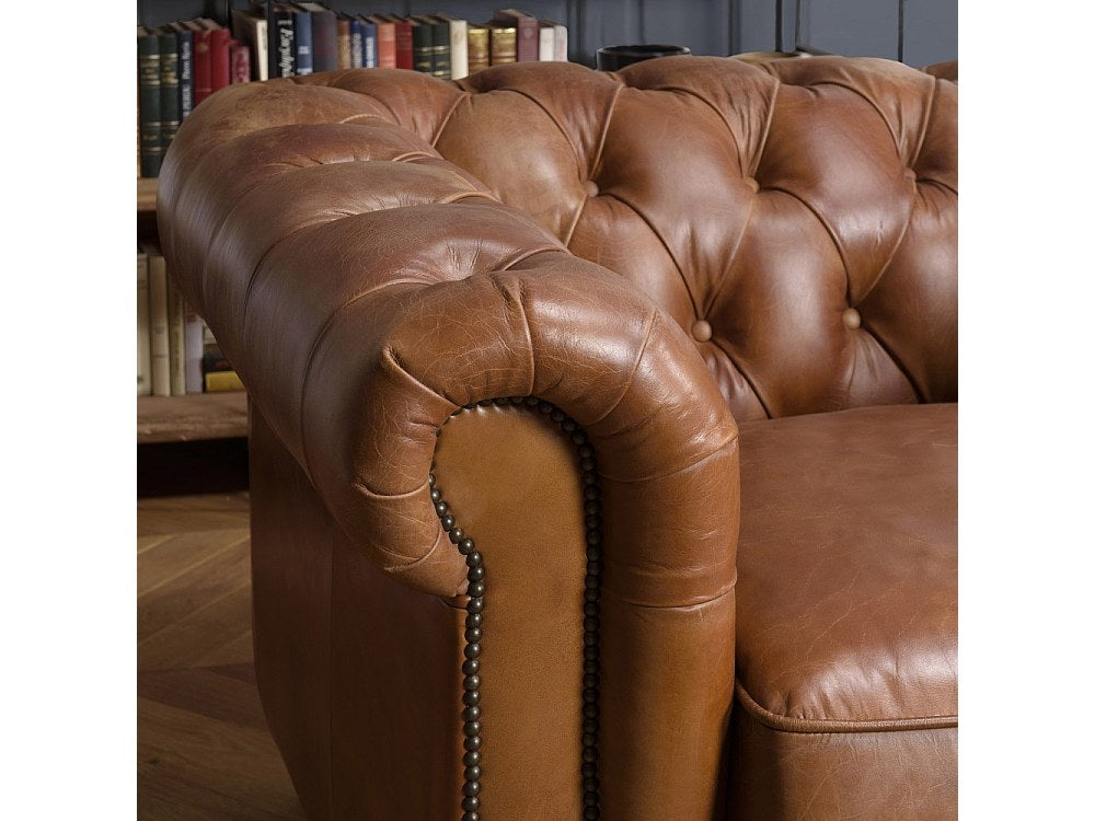 Fauteuil Chesterfield marron cuir